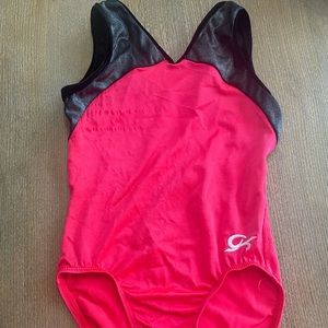 GL leotard- hot orange Child large. Snagging in the back and little in the front